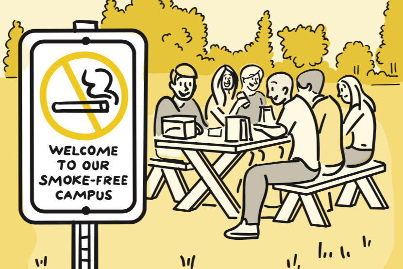 Cartoon of a “No-Smoking” sign in an open outdoor area, with nearby people enjoying a picnic lunch.