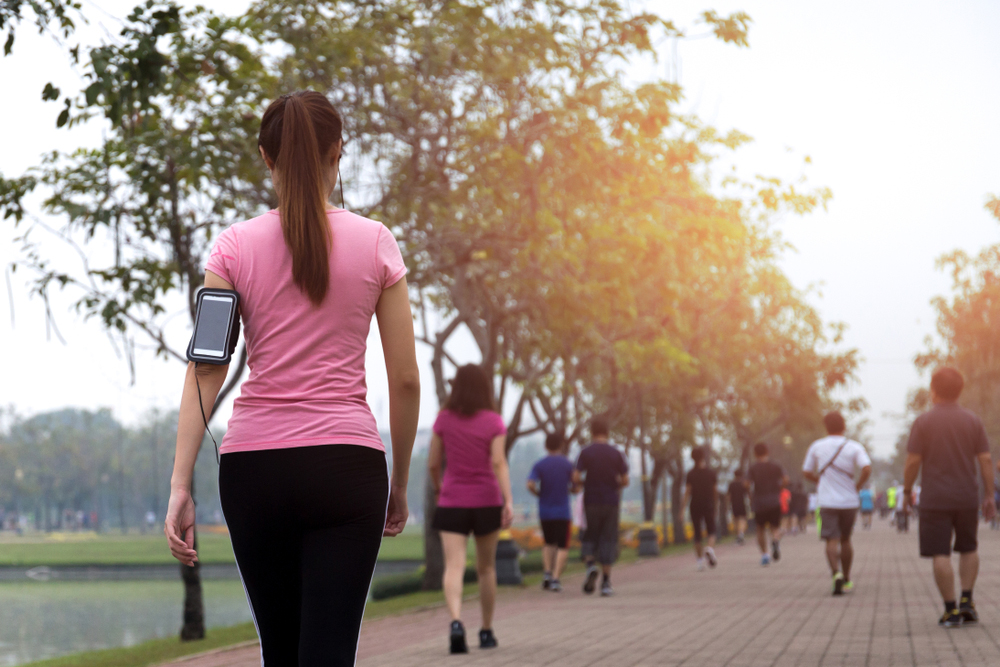 Group of people walking outdoors.