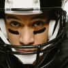 Man wearing a football helmet Man wearing a football helmet.