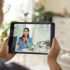 Patient talking to a doctor using a digital tablet Patient talking to a doctor using a digital tablet