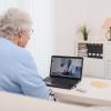 Older adult talking with her doctor on a computer screen Older adult talking with her doctor on a computer screen