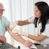 Older man getting his blood drawn