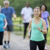 Group of older adults walking in the park on a sunny day Group of older adults walking in the park on a sunny day