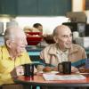Older adult men drinking tea together Older adult men drinking tea together