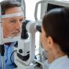 An older man getting an eye exam An older man getting an eye exam
