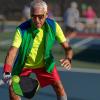 Older man playing pickleball