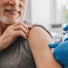 An older adult getting a vaccine