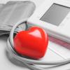 Modern blood pressure monitor with red heart Modern blood pressure monitor with red heart