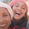 Image of smiling mom and daughter.