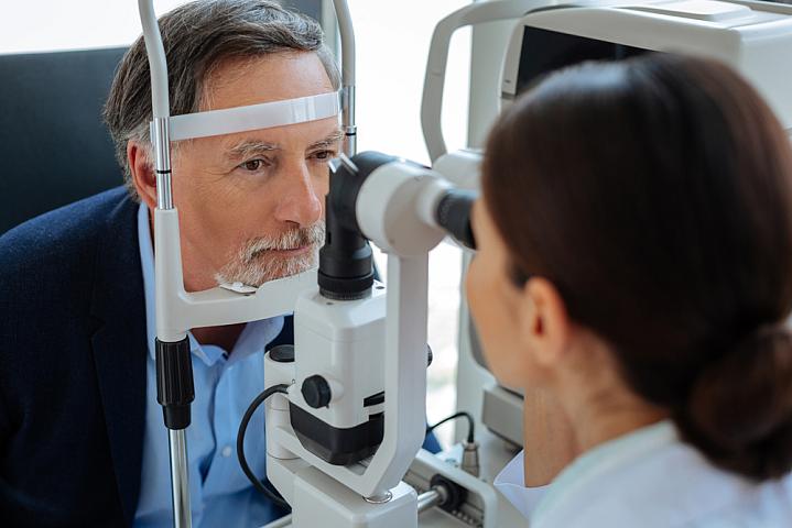 An older man getting an eye exam